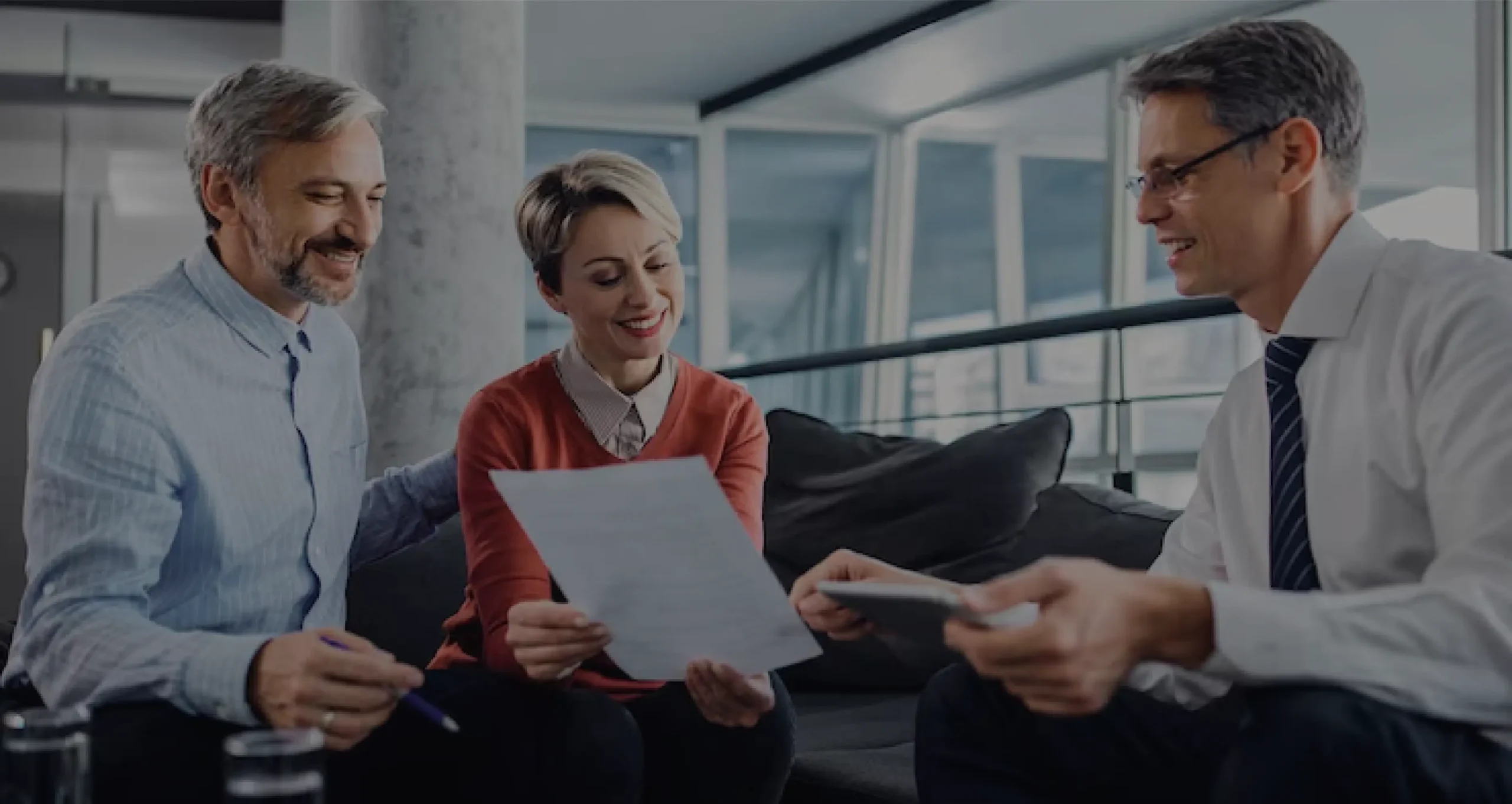 Business owners reviewing insurance cancellation policy with an advisor